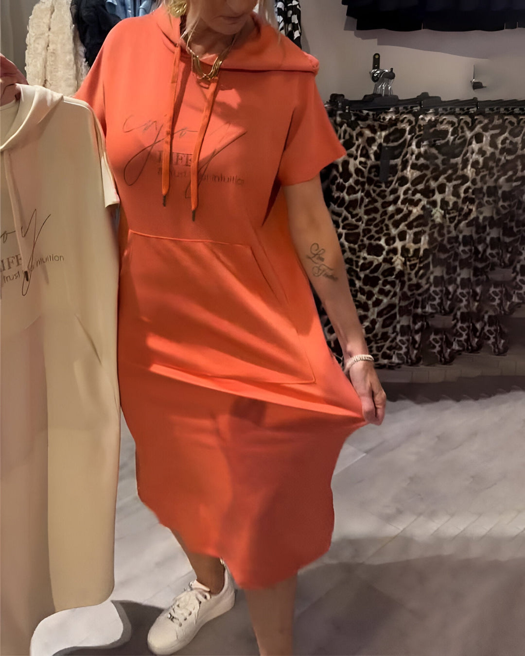 Larkshire™ - Loose dress with hood and feminine fit